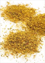 CURRY POWDER AGAINST WHITE BACKGROUND