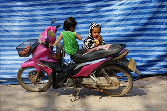 Children on moped