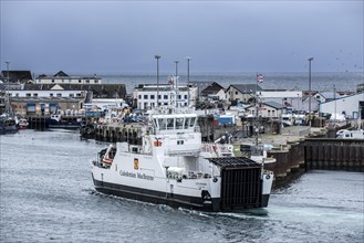 Caledonian Macbrayne's ferry MV Lochinvar enters the port of Mallaig