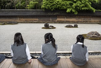 Schoolgirl in Zen Rock Garden