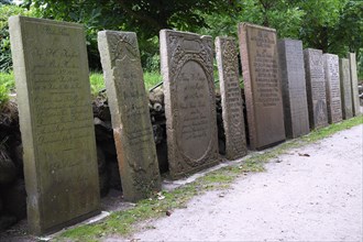 Hundreds of years old grave slabs in the cemetery of Keitum