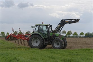 Tractor cultivating