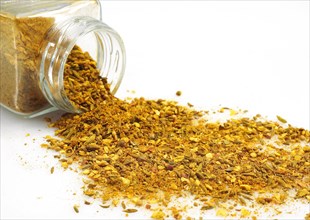 CURRY POWDER AGAINST WHITE BACKGROUND