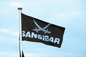 Flag of the cult restaurant Sansibar in the dunes of Rantum