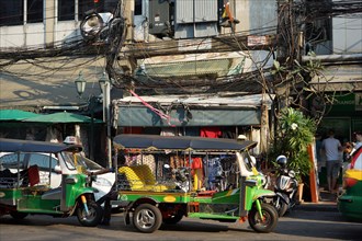 Power cables and tuk-tuks in Bangkok