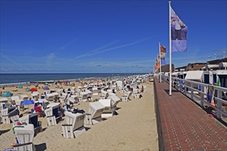 Tourists and beach chairs on the main beach of Westerland