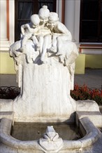 Children with frog fountain