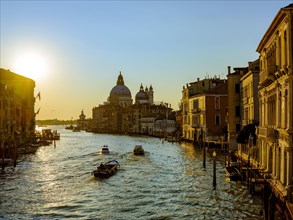 Boats in the Grand Canal at sunrise