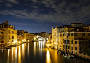 Historic house facades on the Grand Canal at night