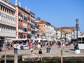 Tourists and stalls on the Rive degli Schiavoni waterfront