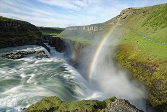 Rainbow over waterfall Gullfoss