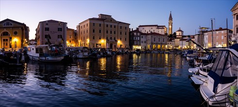 Evening atmosphere at the harbour of Piran