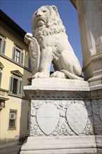 Lion sculpture at the statue of Dante Alighieri