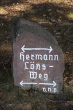 Stone with inscription Hoermann-Loens-Weg