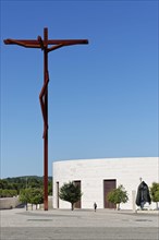 Cross in front of the Church of the Holy Trinity