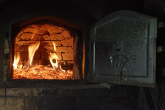 Heat up a stone oven