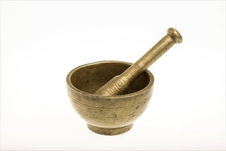 Mortar and pestle against a white background