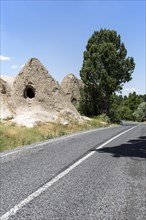 A cave house and a road in Cappadocia