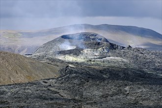 Smoking volcano crater