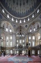 People perform the ritual prayers of Islam in Eyup Sultan