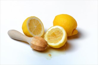 Lemons and lemon squeezer