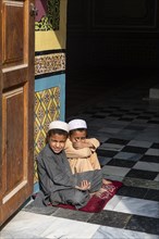 Young students in the Mausoleum of Mirwais Khan Hotaki