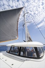 Foresail and galley of a sailing catamaran