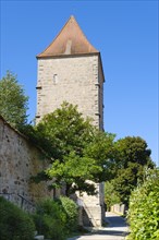 White tower on the city wall in the historic old town