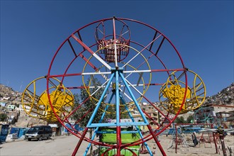Old fashioned playground at the Sakhi Shah-e Mardan Shrine or Ziyarat-e Sakhi