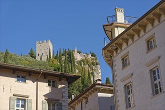 View from Piazza Novembre to the medieval castle ruins Castello di Arco