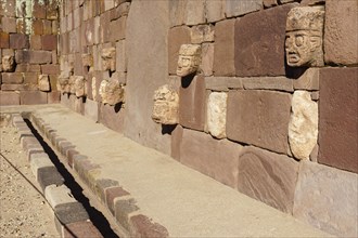 Head reliefs in the Sunken Courtyard