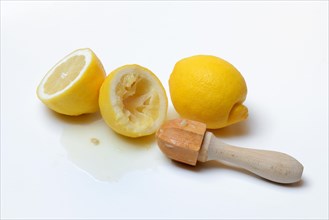 Lemons and lemon squeezer