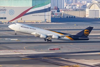 A UPS United Parcel Service Boeing 747-8F aircraft with registration N621UP takes off from Dubai Airport