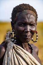 Scar face as a mark of beauty man from the Jiye tribe
