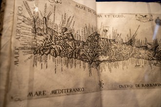 Antique book with an old map of the Mediterranean