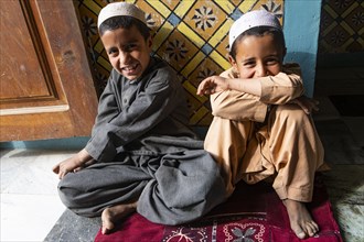 Young students in the Mausoleum of Mirwais Khan Hotaki