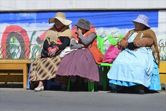 Seated spectators at a parade
