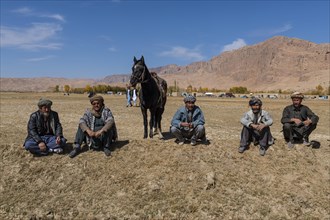 Spectators at traditional Buzkashi game