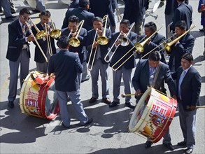 Music group with timpani and trumpets during a parade