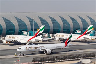 Boeing 777-300ER and Airbus A380-800 aircraft operated by Emirates at Dubai Airport