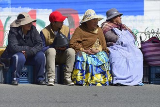 Seated spectators at a parade