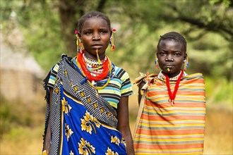 Traditional dressed young girls from the Laarim tribe