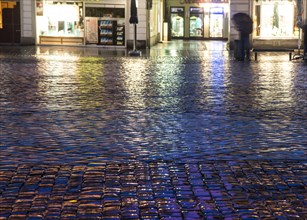 Wet and reflective cobblestones