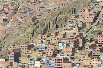 View of the sea of houses on a steep face of the capital