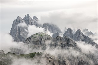 Cloudy rocky mountain peaks
