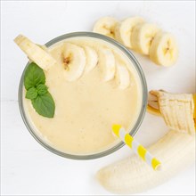Banana Smoothie Fruit Juice Drink Juice in Glass from Top Square