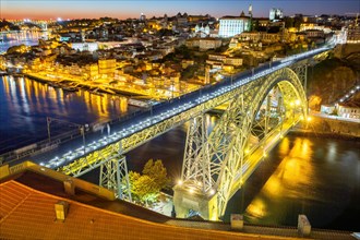 Porto with bridge Ponte Dom Luis I over river Douro night evening travel city in Porto