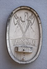 Wooden sign Burgcafe in Gemuenden am Main
