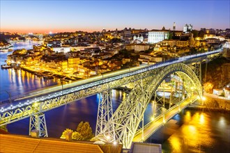 Porto with bridge Ponte Dom Luis I over river Douro night evening travel city in Porto