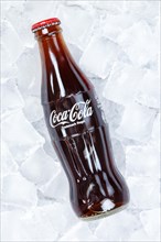 Coca Cola Coca-Cola bottle lemonade soft drink drink on ice cube cubes